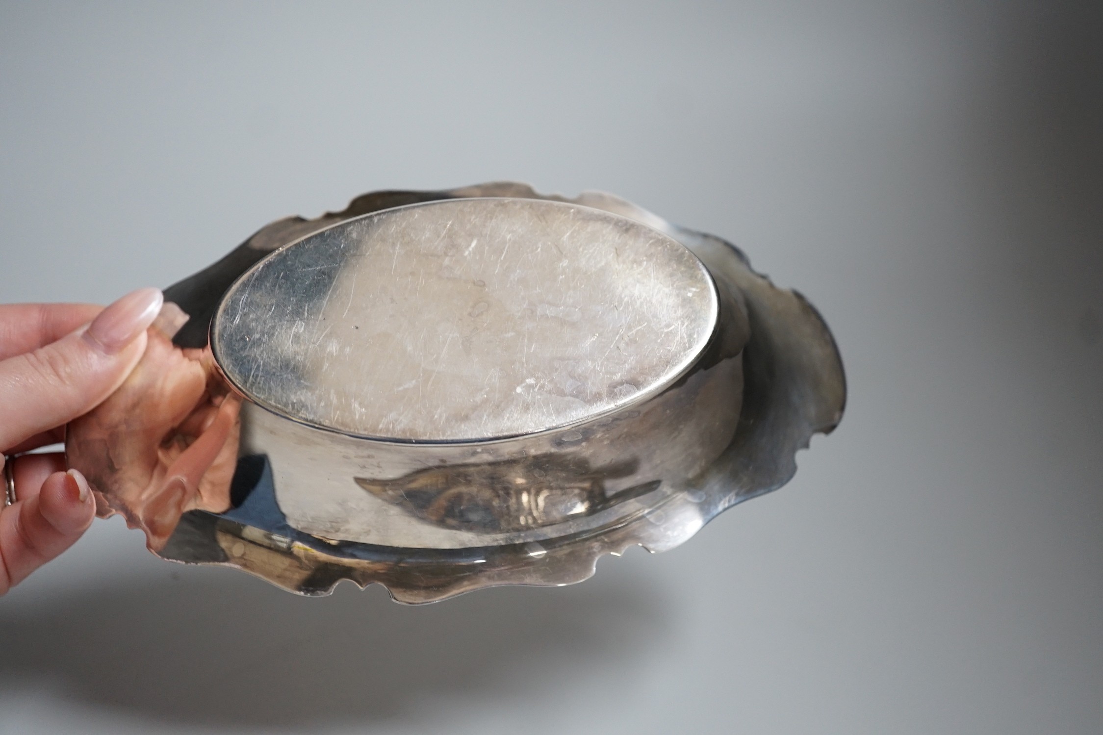 A George V silver bon bon dish, Sheffield, 1928, 19.9cm and a Scandinavian? 925 S white metal mounted dagger sheath, maker EIK.